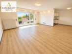 Gepflegte Eigentumswohnung mit Balkon, Weitblick und moderner Ausstattung - Wohnzimmer