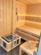 Luxuriöse Erdgeschosswohnung mit Sauna, Whirlpoolbadewanne und eigenem Gartenanteil - Badezimmer mit KI bearbeitet