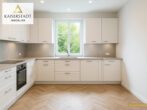 KFW 55 - Stadtvilla im Bauhausstil mit Blick auf den Stadtpark - Küche