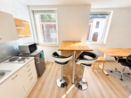 Bezugsfreies, möbliertes 1-Zimmer-Apartment in Uni-Nähe - Küchen und Essbereich