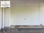 Gartenwohnung mit ca. 500 m² eigenem Garten und Garage in Bestlage - Garage