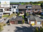 Familienfreundliches Reihenmittelhaus mit Kamin, Garten und Garage in Eschweiler-Neu Lohn - Rückansicht